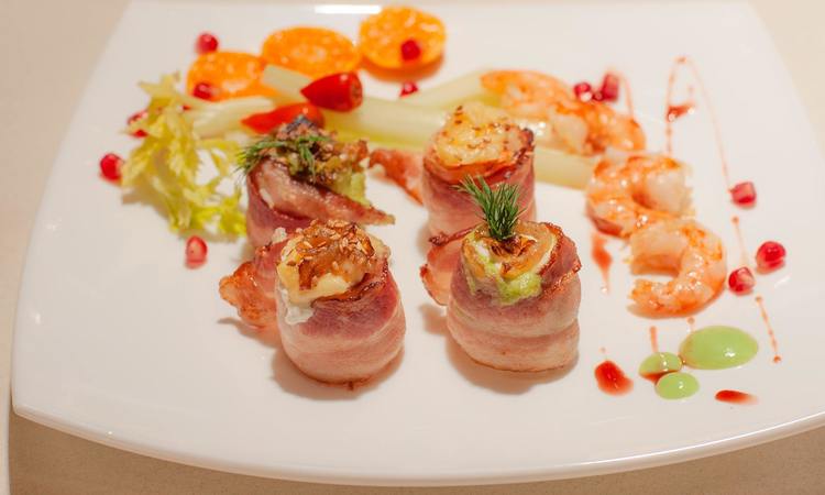 Shrimp Wrapped in Bacon with Mandarin Wedges and Pomegranate Recipe